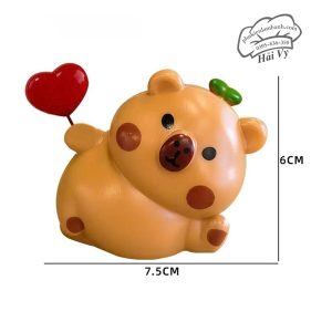 Capybara nằm cầm tim - Con