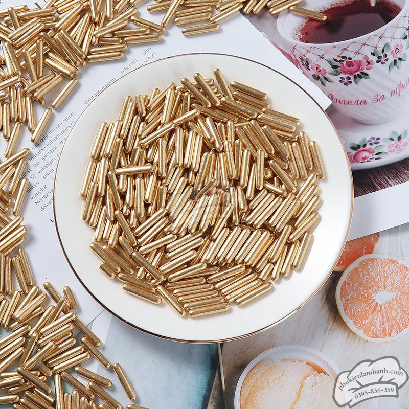 Kẹo hình viên thuốc dài vàng ̣(500g) - Gói
